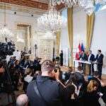 Austria government official discussing proposed social media ban for children under 14 years old