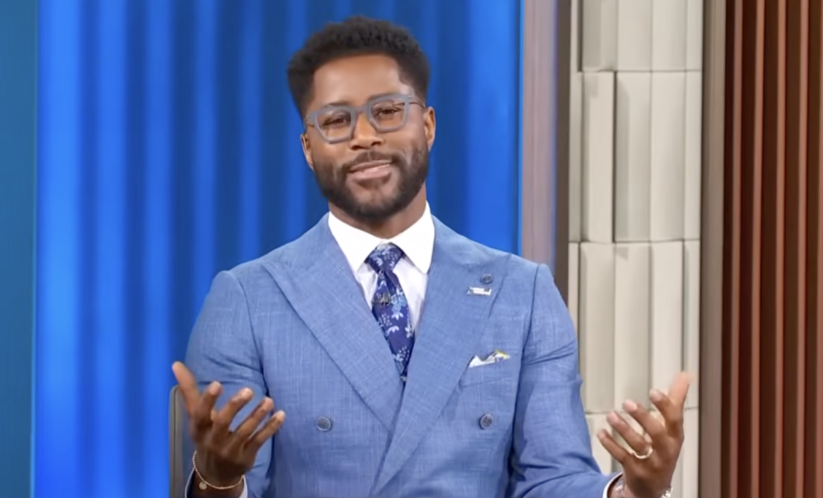 CBS NCAA Tournament halftime show studio panel featuring Nate Burleson and Charles Barkley