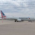 FBI and law enforcement respond to American Airlines flight diverted to Detroit due to mid-air disturbance