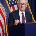Federal Reserve Chair Jerome Powell speaking at Harvard University about interest rate policy