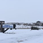 Gillette College campus building exterior with construction update for the Enzi Applied Learning Center
