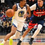 Washington Wizards and Golden State Warriors players in action during an NBA game at Chase Center