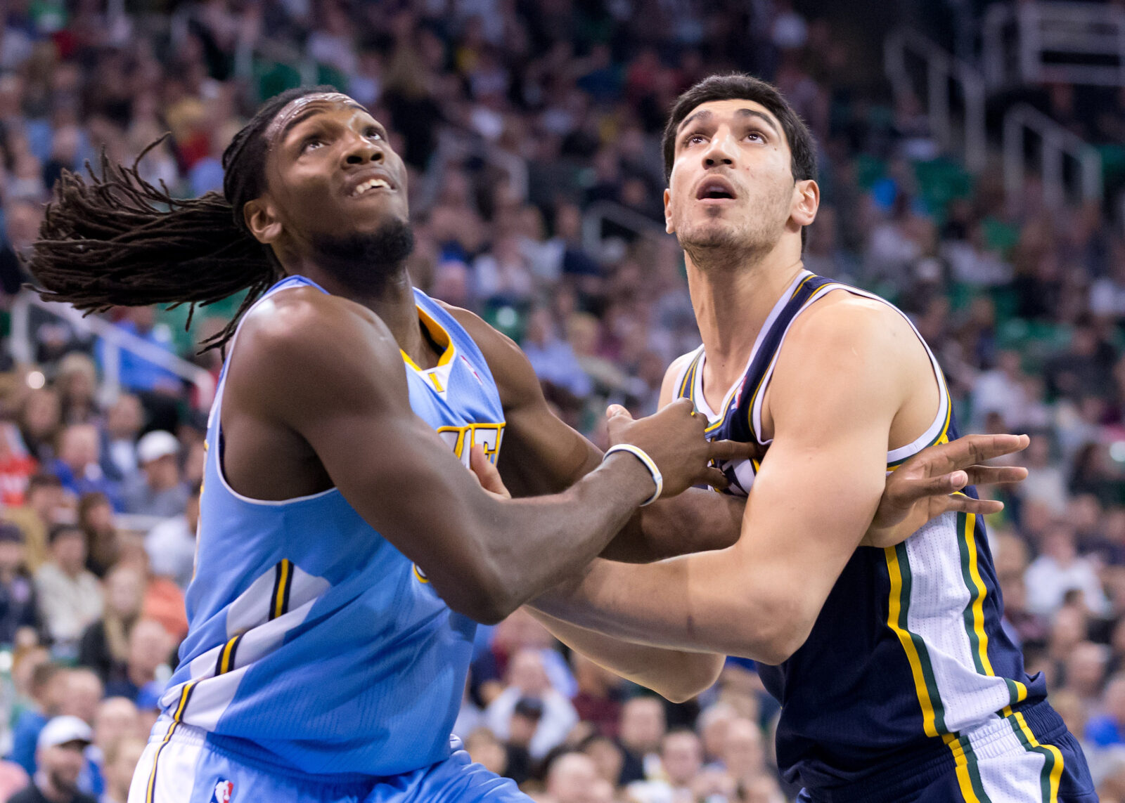 Denver Nuggets vs Utah Jazz players in action during a crucial late-season NBA clash at Ball Arena
