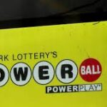 Powerball lottery ticket and $166 million jackpot announcement graphic