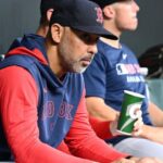 Boston Red Sox manager Alex Cora explaining his Opening Day lineup decision during a press conference
