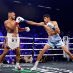 Sebastian Fundora celebrates after TKO victory over Keith Thurman to retain WBC title