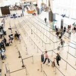 Passenger quickly passing through security checkpoint at a smaller airport with private screening
