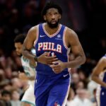 SportsLine Projection Model data visualization favoring the Philadelphia 76ers over the Miami Heat in NBA matchup
