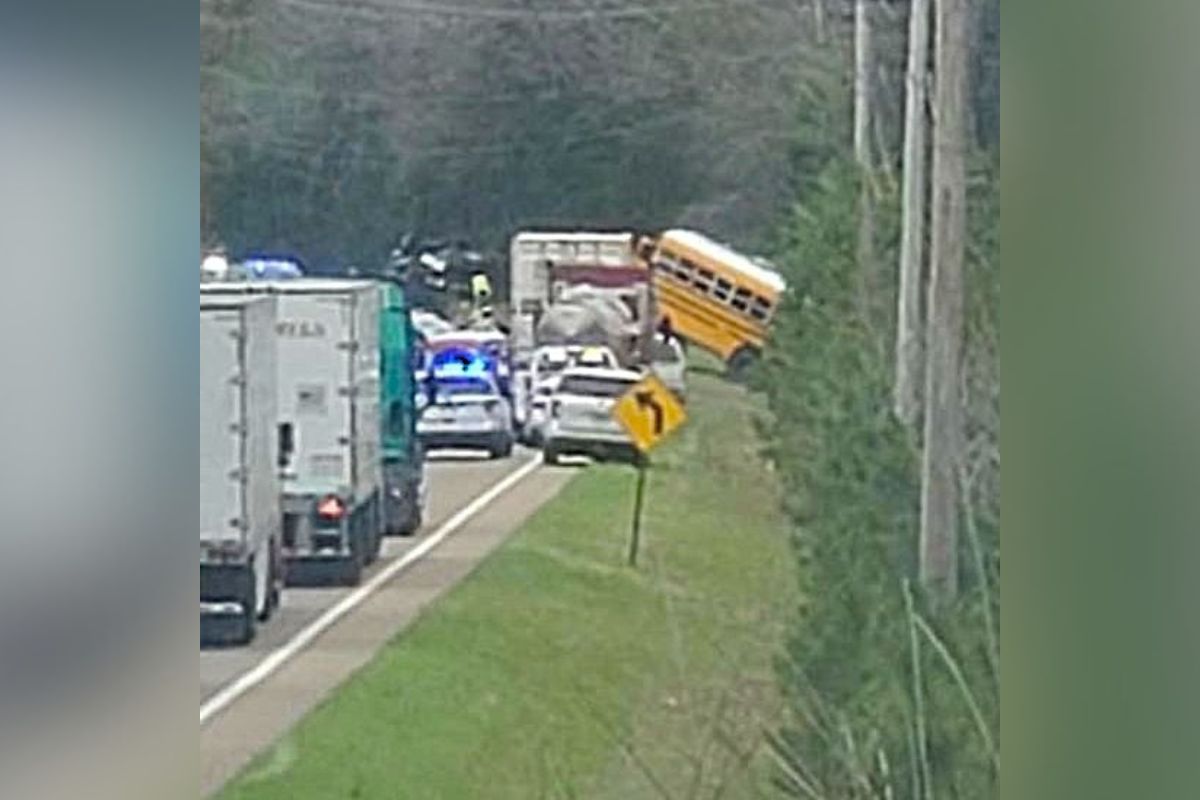 Emergency response scene at fatal Tennessee school bus crash in Carroll County involving a state truck
