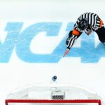 2026 Frozen Four teams Michigan, North Dakota, Wisconsin, and Denver celebrate advancing to Las Vegas