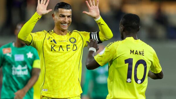 Cristiano Ronaldo and Al-Nassr players in action during a Saudi Pro League match against Al-Ettifaq