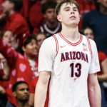 Arizona Wildcats center Motiejus Krivas playing defense in a college basketball game