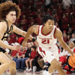 Arkansas Razorbacks guard DJ Wagner driving to the basket in a game