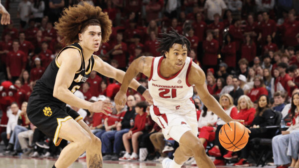 Arkansas Razorbacks guard DJ Wagner driving to the basket in a game