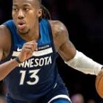 Chicago Bulls guard Ayo Dosunmu writing in his pre-game journal for mental focus