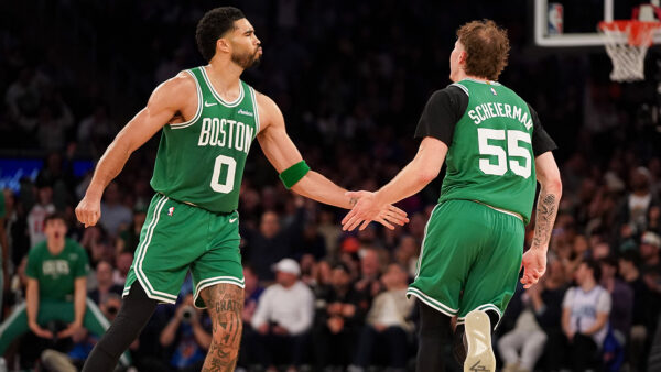 Baylor Scheierman in Celtics uniform during a 2026 game, central to bold playoff predictions