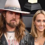 Billy Ray and Tish Cyrus at a public event before their final divorce