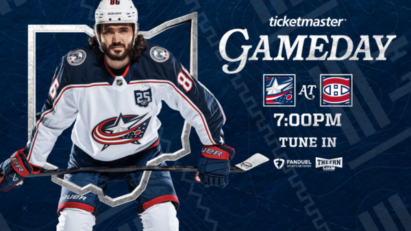 Columbus Blue Jackets players skating against Montreal Canadiens in a crucial NHL game at Centre Bell