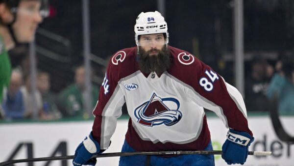 Colorado Avalanche defenseman Brent Burns celebrates his 1000th consecutive NHL game milestone