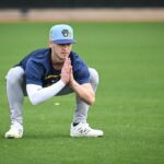 Coleman Crow Milwaukee Brewers pitcher warming up for MLB debut against Pirates