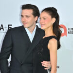 Brooklyn Beckham and Nicola Peltz Beckham at an event, representing the family rift with the Beckhams