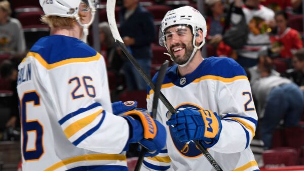 Buffalo Sabres players celebrating after clinching the Atlantic Division title