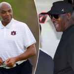 Charles Barkley and Michael Jordan smiling together, reconnecting after their 14-year rift