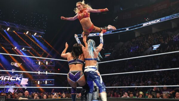 Charlotte Flair in the ring, rejecting retirement talk and stating she's in her prime