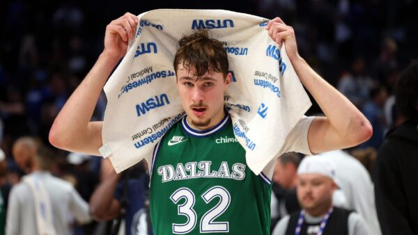Cooper Flagg celebrating after scoring 51 points to make NBA history as the first teenager to reach 50 points