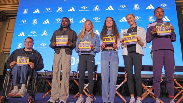 Defending champions Sharon Lokedi and John Korir at the Boston Marathon starting line with record hopes