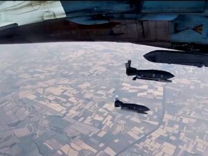 Experts analyzing map of Europe, discussing Russia's air force threat to NATO