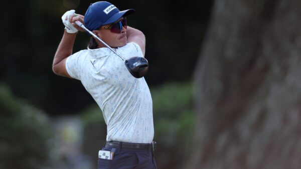 Rickie Fowler and Kurt Kitayama walking together during their RBC Heritage pairing at Harbour Town Golf Links