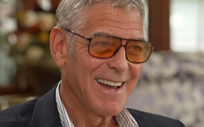 George Clooney smiling in a candid interview about aging as a privilege