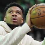 Giannis Antetokounmpo looking concerned on Milwaukee Bucks sideline after playoff loss