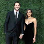 Hailee Steinfeld and Josh Allen smiling together after welcoming their first baby girl