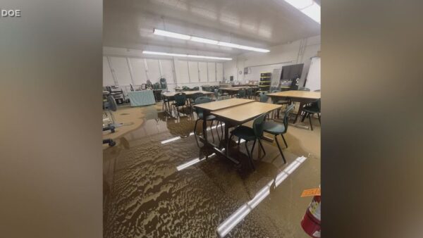 Hawaii school campus showing severe flooding and storm damage from Kona low weather system