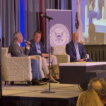 Steve Hilton and Chad Bianco debate on stage at the California GOP gubernatorial forum in Rancho Mirage