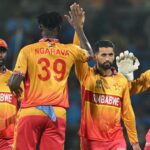 Indian cricket team players celebrating during a T20 match against Zimbabwe