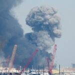 Smoke rises over Manama Bahrain following claimed IRGC cyber and drone attacks on cloud infrastructure