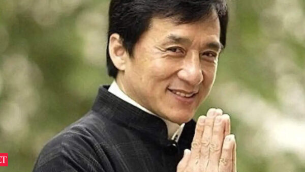 Jackie Chan posing, symbolizing his rejection of the Bruce Lee clone label and unique action legacy