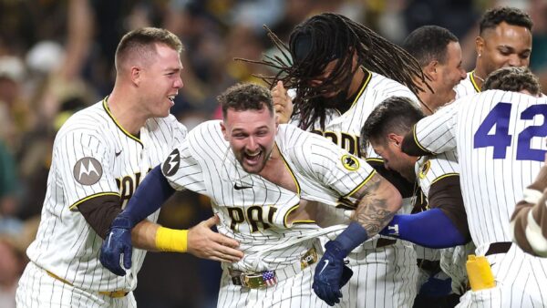 Jackson Merrill celebrates his walk-off double for the San Diego Padres