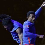 Jalen Duren and Isaiah Stewart of the Detroit Pistons celebrating a play together
