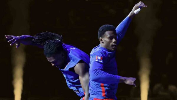 Jalen Duren and Isaiah Stewart of the Detroit Pistons celebrating a play together