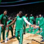 Jaylen Brown celebrating a Celtics win during the 50-win season
