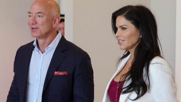 Jeff Bezos and Lauren Sánchez smiling together during an interview about their daily rituals and partnership