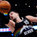 Nikola Jokic driving to the basket against Memphis Grizzlies defense