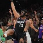 Jordan Goodwin celebrating a play during the Suns' Play-In win over the Warriors