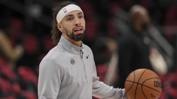 Jose Alvarado Knicks guard sits on bench during playoff game