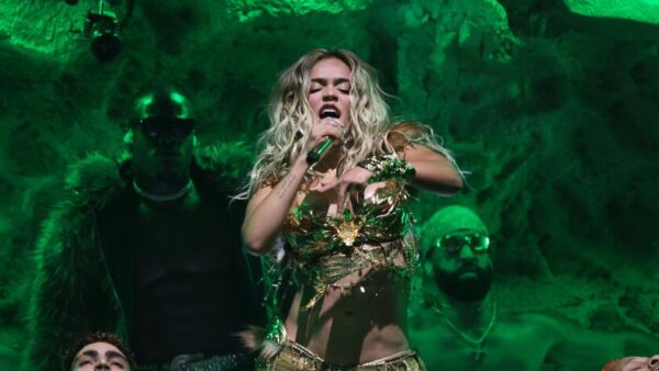 Karol G performing on stage at Coachella music festival