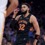 Karl-Anthony Towns flexing after a drive against the Atlanta Hawks in the Knicks playoff game